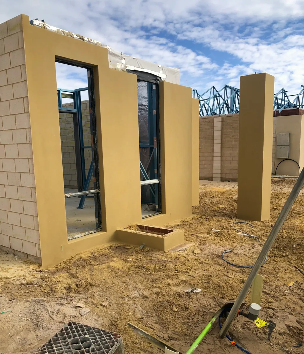 Ochre textured walls around window openings