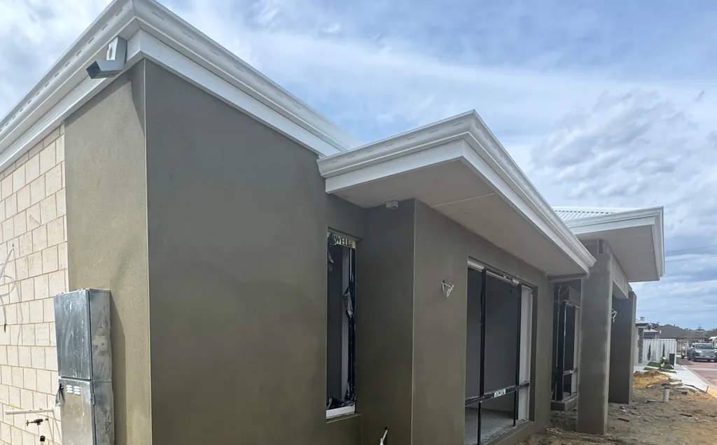 Home with olive-grey external render