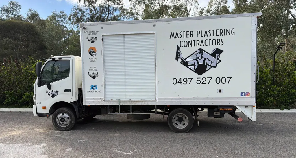 White Master Plastering Contractors truck