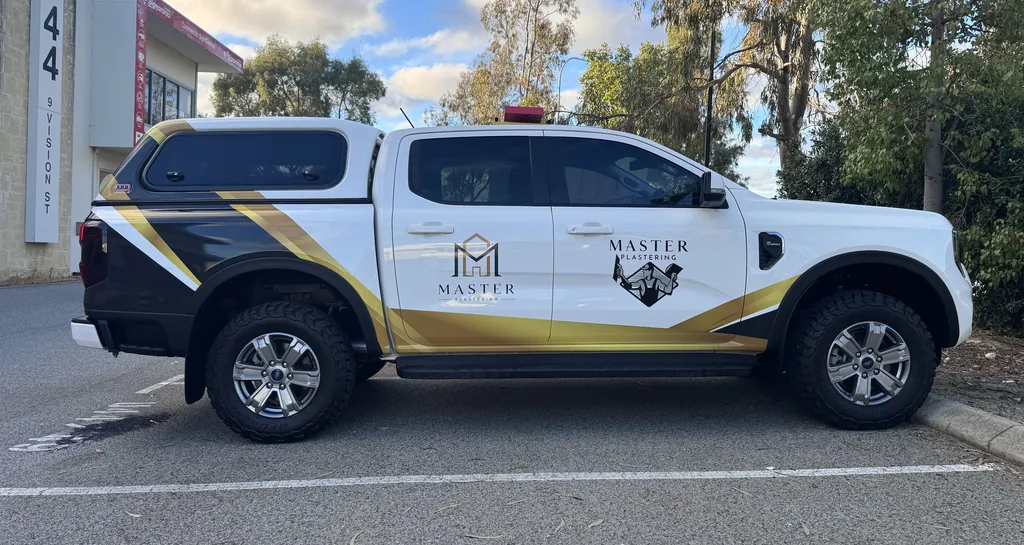 Master Plastering ute, driver side