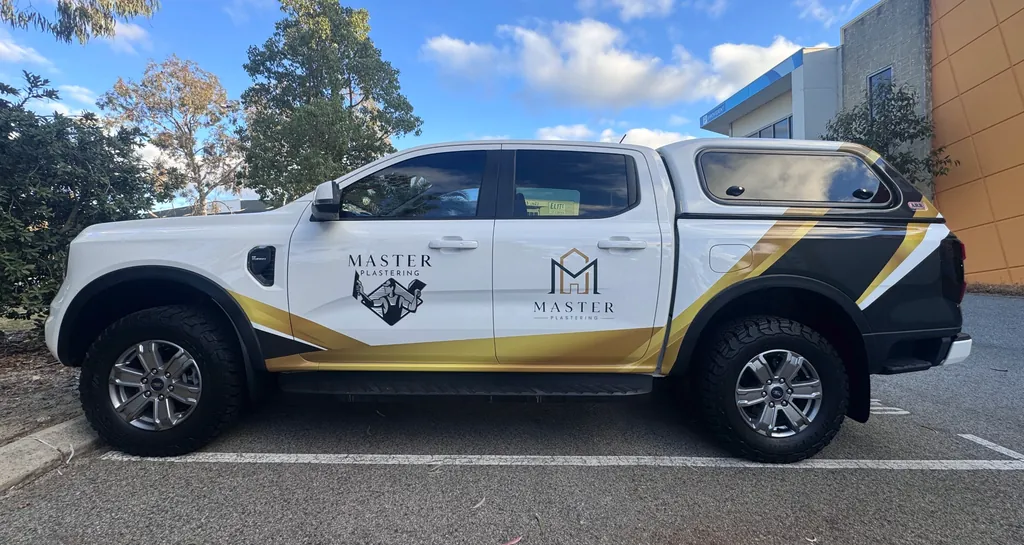 Master Plastering ute, passenger side
